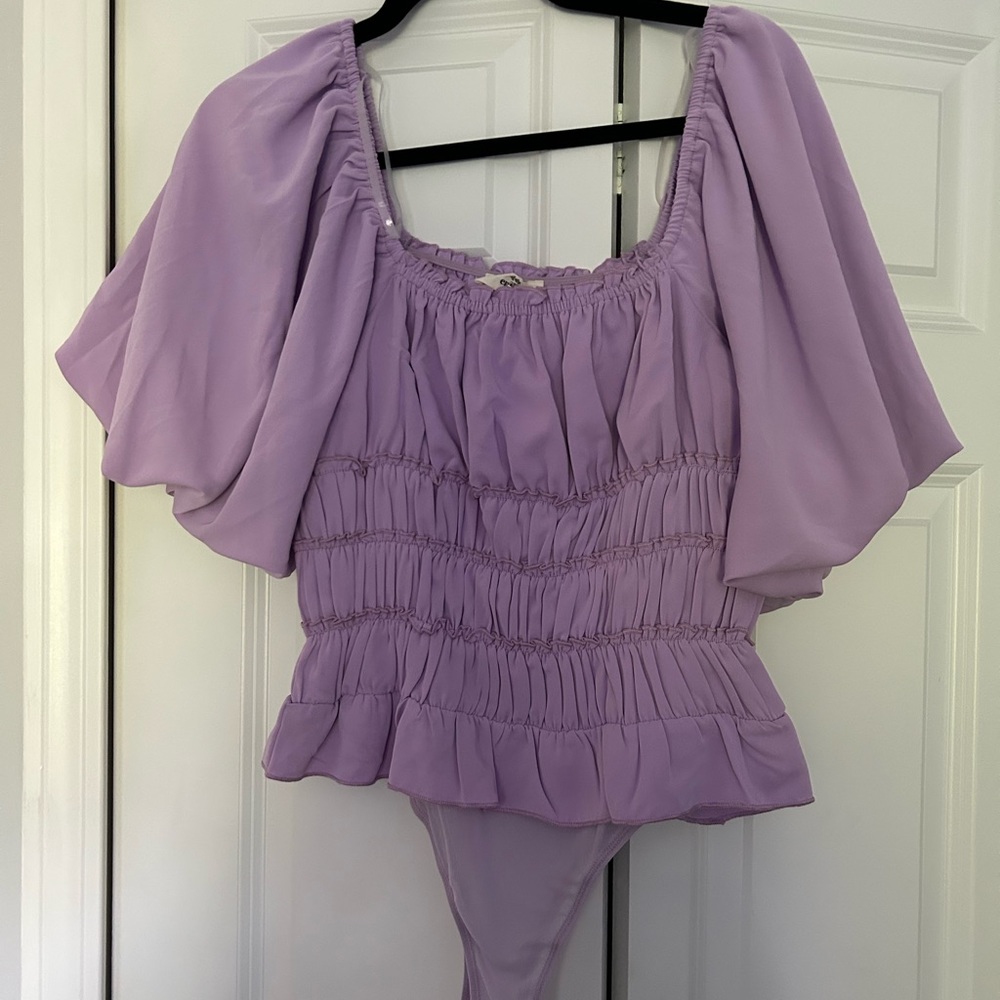 The post bodysuit
